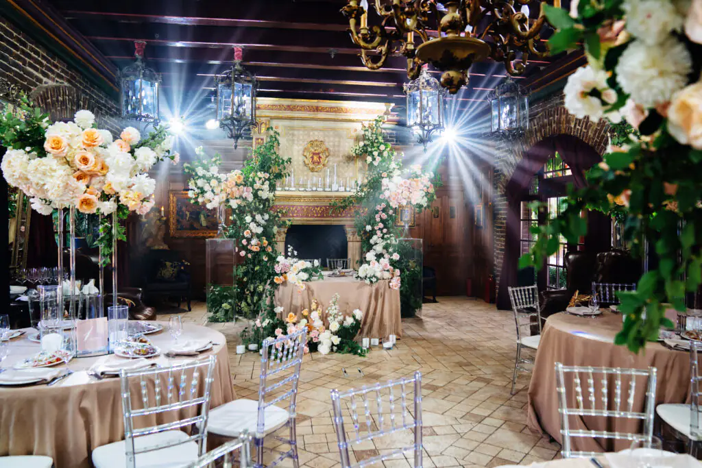 | decor of fresh flowers in the restaurant for a wedding banquet.