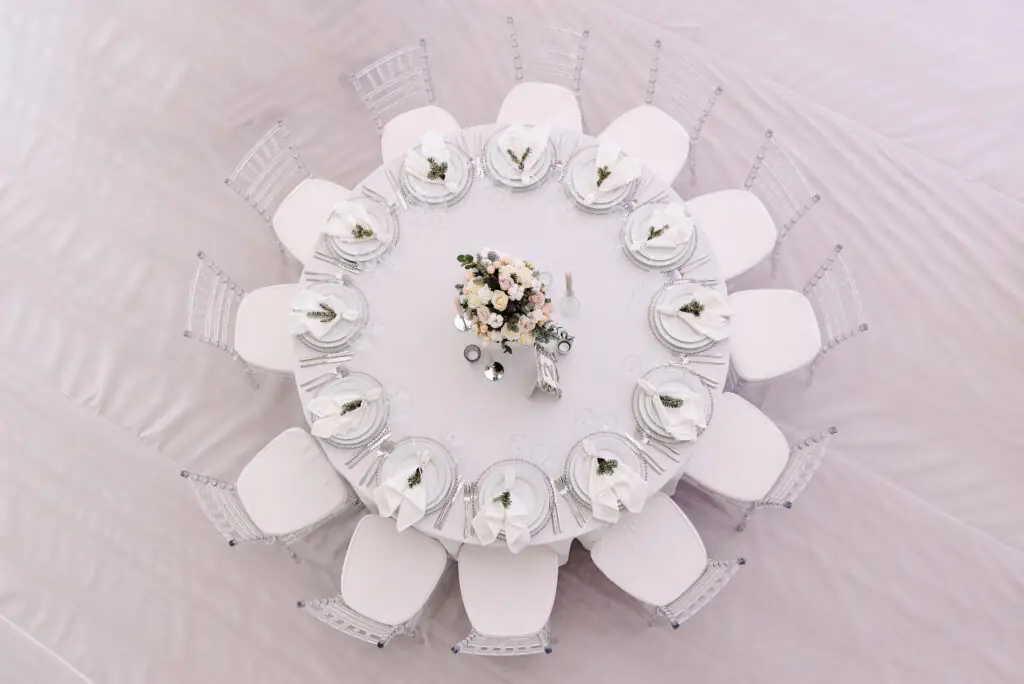 | Well decorated guest numbered table in down-view photo