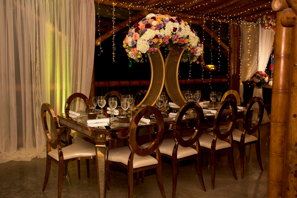 | Table decorated with flowers and modern chairs